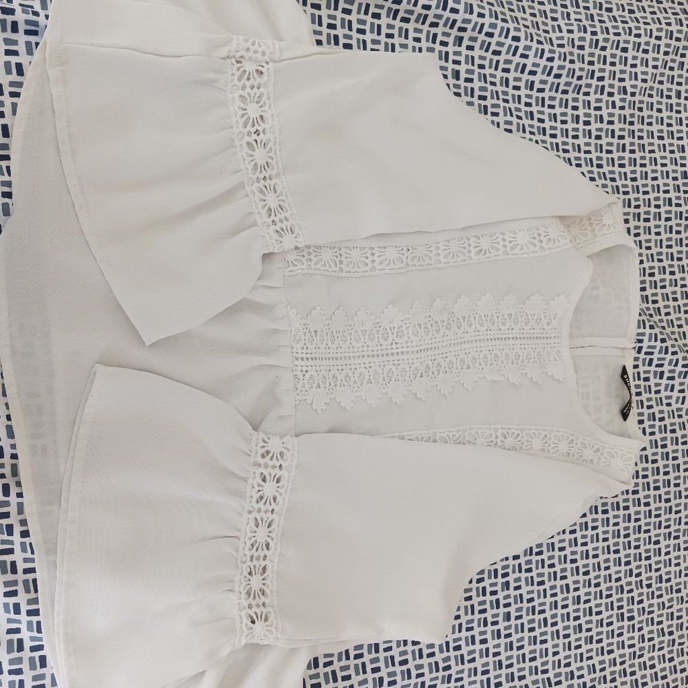 Women beautiful white blouse with ruffle sleeve in size small
